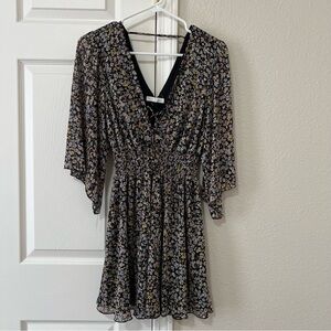 Women’s Black Floral V-Neck Dress with 3/4 Bell Sleeves and Cross Tie Front - L